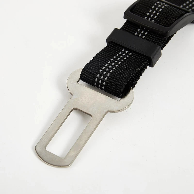 Reflective adjustable seat belt attachment for dogs